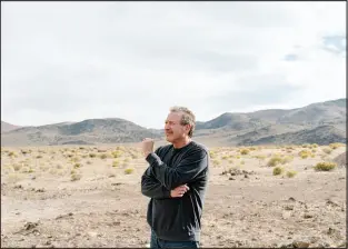  ?? JASON HENRY / NEW YORK TIMES FILE (2018) ?? Jeffrey Berns surveys part of the 67,000acre desert site where he envisioned building a community based on blockchain technology in Storey County on Oct. 23, 2018.