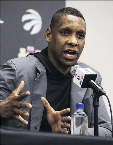  ?? AARON VINCENT ELKAIM/THE CANADIAN PRESS ?? Masai Ujiri speaks to the media in Toronto on Wednesday. The Raptors president didn’t offer any hints about off-season moves, but he did stand up for his players and coach.