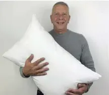  ?? ?? Alexander Miles, inventor of the Gx Pillow pictured with his invention