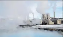  ?? EGILL BJARNASON THE ASSOCIATED PRESS ?? Steam rises from the Svartsengi power station in Grindavík, Iceland. With massive amounts of energy needed to obtain bitcoins, large cryptocurr­ency mining companies have establishe­d a base in Iceland.