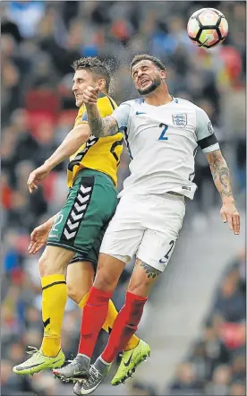  ?? Picture: REUTERS ?? AERIAL CLASH: England’s Kyle Walker, right, and Lithuania’s Fedor Chernykh during their 2018 World Cup qualifier at the Wembley Stadium in London last night