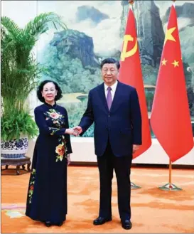  ?? XIE HUANCHI / XINHUA ?? President Xi Jinping, also general secretary of the Communist Party of China Central Committee, meets with Truong Thi Mai, a member of the Political Bureau of the Communist Party of Vietnam Central Committee, in Beijing on April 26.