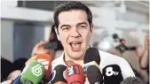  ?? MILOS BICANSKI,
GETTY IMAGES ?? Greek Prime Minister Alexis Tsipras speaks to the news media after voting Sunday in the referendum in an Athens suburb. He had urged people to vote no.