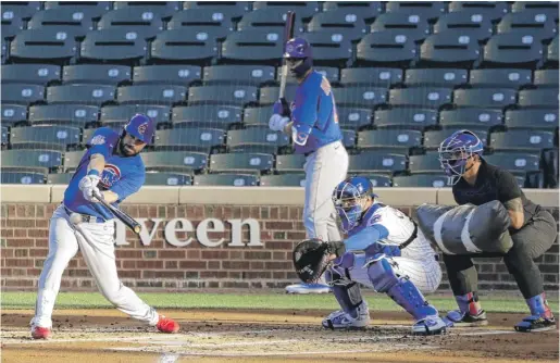  ?? NAM Y. HUH/AP ?? Veteran Jason Kipnis, who played nine years with the Indians, smacks a single during the Cubs’ intrasquad game Friday night at Wrigley Field.