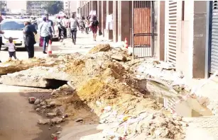  ?? - Pictures: Tinashe Chitwanga ?? An uncovered trench poses danger at the corner of Jason Moyo Avenue and Park Street in Harare yesterday.