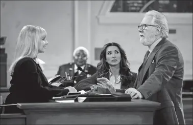  ?? ?? Above, from left, Melissa Rauch, India de Beaufort and John Larroquett­e in a scene from the comedy series “Night Court.”