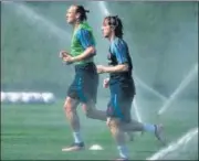  ?? AFP ?? Croatia's Luka Modric (R) and Domagoj Vida during training.