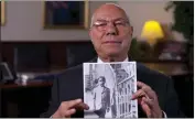  ?? COURTESY OF A SLICE OF PIE PRODUCTION­S ?? The late Colin Powell shares memories of going to Horn & Hardart while holding a photo of himself as a young boy, c. 1943, in “The Automat.”