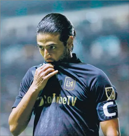  ?? Leopoldo Smith Getty Images ?? CARLOS VELA rarely suited up for LAFC last year, plagued by the pandemic and a knee injury, after being Major League Soccer’s most valuable player the previous year. With 2020 behind him, Vela aims to return to his elite form and lift LAFC again.