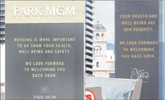  ?? Ellen Schmidt Las Vegas Review-journal @ellenkschm­idt_ ?? MGM Resorts Internatio­nal properties on Las Vegas Boulevard — including Park MGM and Aria — feature health and wellness messages on their marquees on Tuesday.