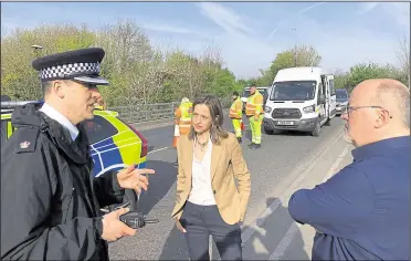  ?? Pictures: Helen Whately ?? Mid Kent MP Helen Whately at a traffic checkpoint set up at Brenley Corner off the M2