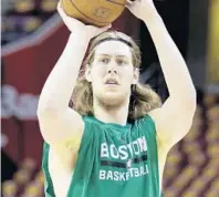  ?? AP/FILE ?? Forward Kelly Olynyk, who earned a reputation in Boston as a banger, signed a four-year contract with the Heat on Thursday.