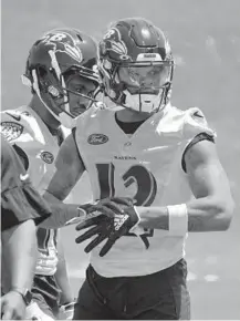  ?? KARL MERTON FERRON/BALTIMORE SUN ?? Ravens wide receiver Rashod Bateman looks on during practice May 26.