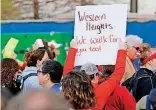  ?? [PHOTO BY NATE BILLINGS, THE OKLAHOMAN ARCHIVES] ?? A person holds a sign April 3 noting support for Western Heights teachers during the second day of a walkout by Oklahoma teachers at the state Capitol in Oklahoma City. On April 2, the Western Heights School Board voted 4-1 to limit the district’s...