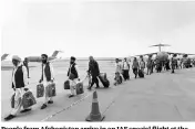  ?? PHOTO: PTI ?? People from Afghanista­n arrive in an IAF special flight at the Hindon Air Force Station