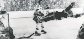  ?? RaY LUSSIER/THE ASSOCIATED PRESS/FILE ?? Bobby Orr scoring the Stanley Cup-clinching goal for the Boston Bruins against the St. Louis Blues on May 10, 1970 is a Mount Rushmore all-time sports moment for Don Brennan.