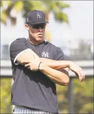  ?? Icon Sportswire via Getty Images ?? The Yankees’ Aaron Judge stretches during a February spring training workout at George M. Steinbrenn­er Field in Tampa, Fla.