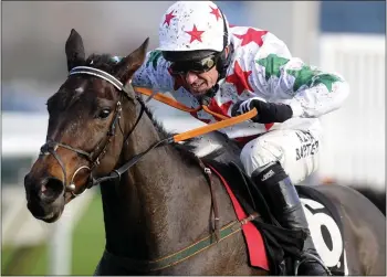  ??  ?? OVER THE LAST: Tony McCoy drives Carrigmoor­na Rock on to win the Thoroughbr­ed breeders’ Associatio­n Mares’ Novices’ Hurdle at Newbury