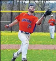  ?? KYLE MENNIG — ONEIDA DAILY DISPATCH ?? Oneida’s James Dick runs in to make a catch and retire a Cazenovia batter.