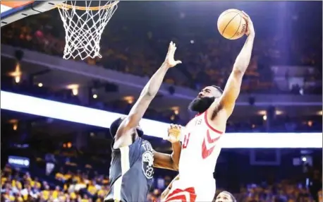  ?? AFP ?? James Harden of the Houston Rockets dunks a basket against the Golden State Warriors in Game 4 of the Western Conference Finals of the 2018 NBA Playoffs at Oracle Arena on Tuesday in Oakland, California.