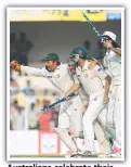  ??  ?? Australian­s celebrate their 2004 Test triumph in India.