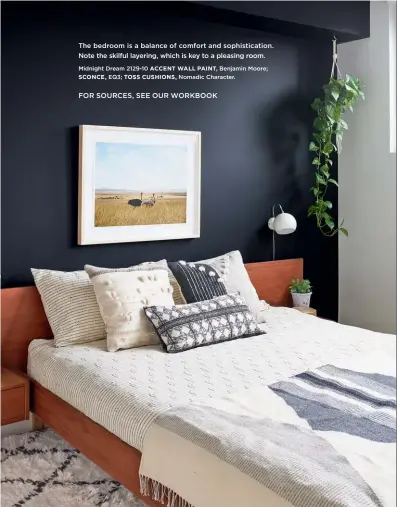  ??  ?? The bedroom is a balance of comfort and sophistica­tion. Note the skilful layering, which is key to a pleasing room. Midnight Dream 2129-10 ACCENT WALL PAINT, Benjamin Moore; SCONCE, EQ3; TOSS CUSHIONS, Nomadic Character. FOR SOURCES, SEE OUR WORKBOOK