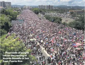  ??  ?? > Thousands of people call for the ousting of Ricardo Rossello in San Juan, Puerto Rico