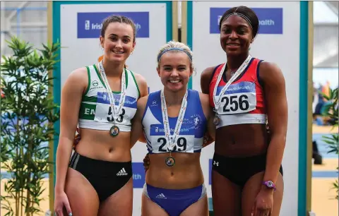  ??  ?? Women’s 60m medallists, from left, Ciara Neville of Emerald AC, Co. Limerick, silver, Molly Scott of St Laurence O’Toole A.C., Co. Carlow, gold, and Patience Jumbo-Gula of Dundalk St. Gerards AC, Co. Louth, bronze.