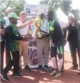  ??  ?? Galadima football academy of Abuja receiving the winners trophy at the end of the 5th Dreamland Hungary Embassy Cup held in Abuja.