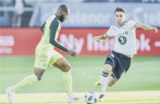  ??  ?? 0 Celtic’s Olivier Ntcham, left, and Rosenborg’s Anders Trondsen battle in the 0-0 draw last night which saw the Scots reach the next Champions League qualifying stage.