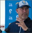  ?? BRIAN VAN DER BRUG/LOS ANGELES TIMES ?? Chargers defensive coordinato­r Gus Bradley talks with reporters after a camp session in Costa Mesa on June 11, 2019.