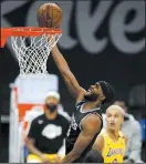  ?? EZRA SHAW/GETTY IMAGES ?? The Kings' Maurice Harkless goes up for a shot against the Lakers in Sacramento on April 2.