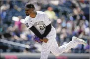  ?? ASSOCIATED PRESS ?? The Reds acquired three relief pitchers in trades Wednesday, including Mychal Givens from the Rockies, once a closer for the Orioles.