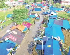  ??  ?? An aerial picture shows a temporary shelter for people affected by the quake in Mamuju.