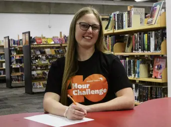  ?? PHOTO: LUISA GIRAO ?? Dedicated scribe . . . Verdon College pupil Kayla Barker (17) and her friend, Katie Dennis, will spend 40 hours writing 400 letters to raise awareness and funds to provide clean water to communitie­s in Malawi.