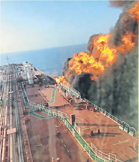  ??  ?? A huge fire rages on the Front Altair after the attacks in the Gulf of Oman