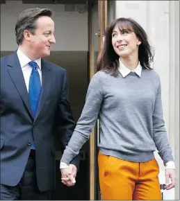  ?? — REUTERS ?? David Cameron and his wife Samantha outside the prime minister’s official residence last week.