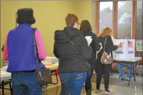  ?? BARRY TAGLIEBER — FOR DIGITAL FIRST MEDIA ?? Voters line up to vote at the First United Methodist Church in Phoenixvil­le on Tuesday. A strong turnout by Democratic voters helped elect Democrats throughout Chester County.