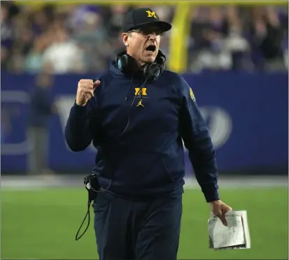  ?? RICK SCUTERI – THE ASSOCIATED PRESS ?? Jim Harbaugh takes over as head coach of the Chargers after guiding Michigan to a national championsh­ip and an unbeaten season.