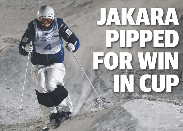  ?? Pictures: JEFF SWINGER ?? BACK ON PODIUM: Barwon Heads skier Jakara Anthony competes in the finals of the World Cup freestyle skiing moguls event in Utah yesterday.