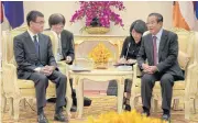  ?? AFP ?? Japan’s Foreign Minister Taro Kono, left, listens to Cambodia’s Prime Minister Hun Sen during their meeting at the Peace Palace in Phnom Penh.