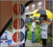  ?? PETE BANNAN – DIGITAL FIRST MEDIA ?? “I Voted Today” stickers hang outside the Mary Taylor House on Walnut Street in Ward 1 of West Chester on Election Day, Tuesday.