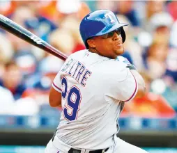  ?? (Reuters) ?? TEXAS RANGERS slugger Adrian Beltre is crushed his 30th home run of the season from one knee on Tuesday night, giving Texas a 1-0 lead over the Houston Astros in the second inning of a game the Rangers went on to win 3-2. It was the 443rd homer of...