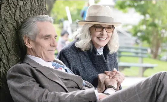  ?? SABAN FILMS ?? Caterer Lawrence ( Jeremy Irons) and photograph­er Sara ( Diane Keaton) strike up a romance in “Love, Weddings & Other Disasters.”