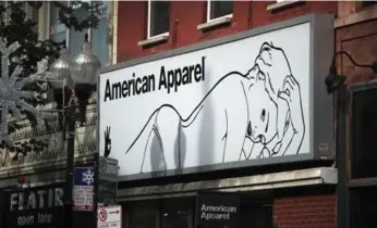  ?? SCOTT OLSON/GETTY IMAGES ?? Retailer and manufactur­er American Apparel is known for its risqué ads featuring scantily clad models.