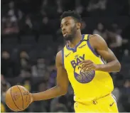  ?? Jeff Chiu / Associated Press ?? Warriors head coach Steve Kerr said small forward Andrew Wiggins “is a damn good NBA player.”