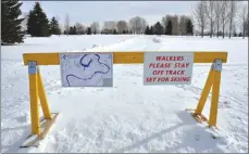  ?? Photo by Matthew Liebenberg/Prairie Post ?? Signage are posted at the start of the groomed ski trails next to the clubhouse at the Chinook golf course.