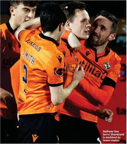  ??  ?? Halfway line hero: Shankland is mobbed by team-mates