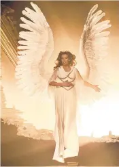  ??  ?? Emma Thompson as The Angel America in the 2003 HBO mini-series, right