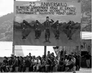  ?? AP ?? In this January 2019 photo, members of the Zapatista National Liberation Army attend an event marking the 25th anniversar­y of the Zapatista uprising in La Realidad, Chiapas, Mexico.